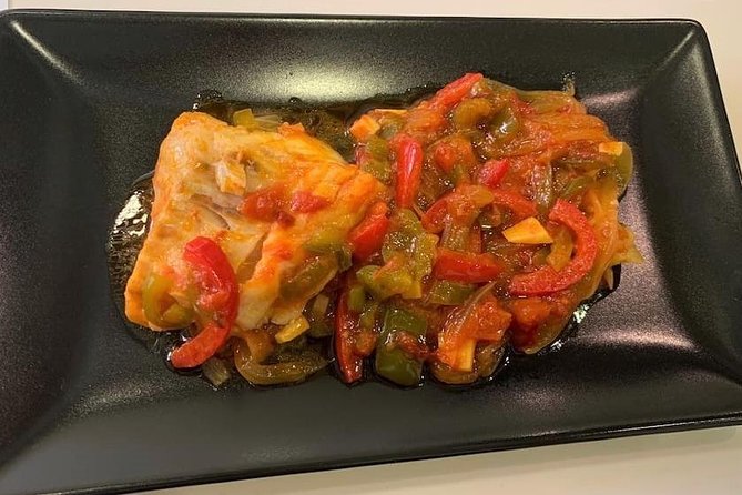 Spanish Tapas & Paella Cooking Class in Central Madrid with Lola - Key highlights at a glance