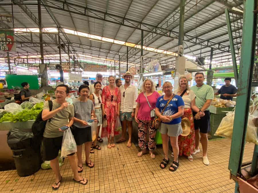 Thai Cooking Class with Market & Garden Tour - Wooddy Kitchen in Kata: the welcome, the garden walk, and the kitchen setup
