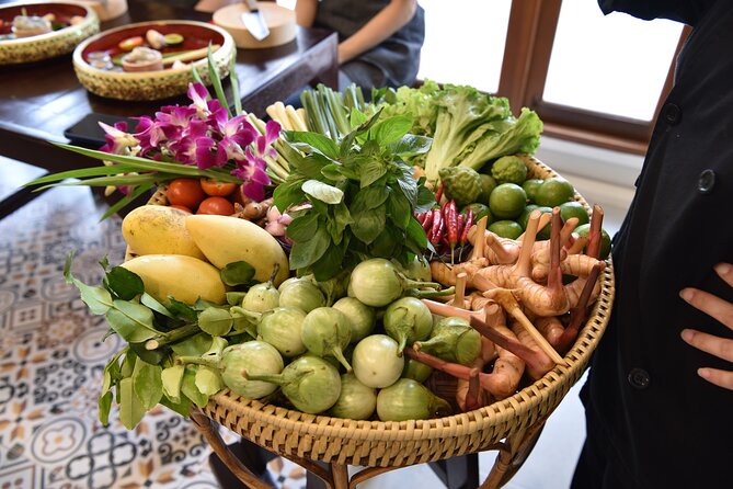Thai Cooking Class with Market Tour in Sathon Bangkok - Cooking four Thai dishes: expect technique, not just food