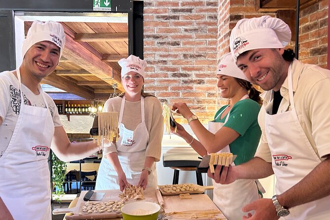 Traditional Cooking Class with Wine Pairing in Rome - Tiramisu building: getting the layers and balance right