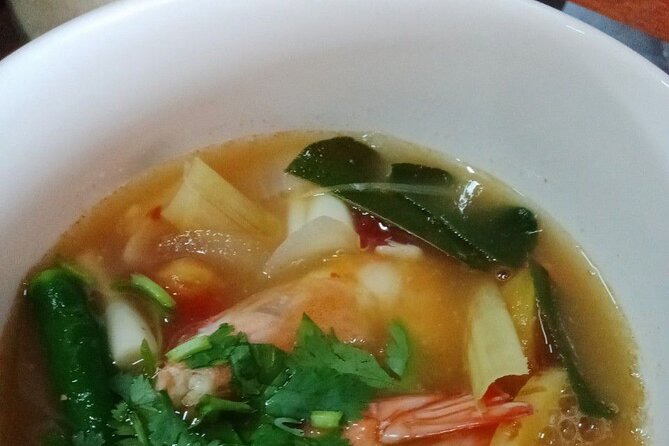 Traditional Thai Cooking Class with Smart Cook - Open-air kitchen setup and the instructors that make it click