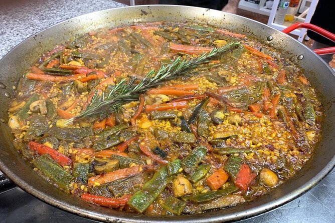 Vegetable Paella cooking class, tapas and Ruzafa market visit - Eating like Valencia: paella plus salad, wine, cake, sweets